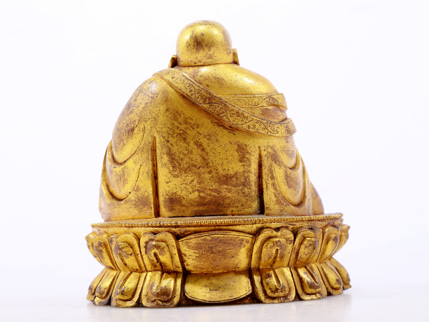 A serene gilt bronze Maitreya statue