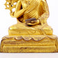 A serene gilt bronze statue of Tsongkhapa