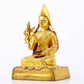 A serene gilt bronze statue of Tsongkhapa