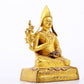 A serene gilt bronze statue of Tsongkhapa