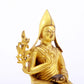 A serene gilt bronze statue of Tsongkhapa