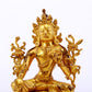 A serene gilt bronze green Tara statue