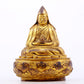 A serene gilt bronze statue of Tsongkhapa