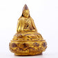 A serene gilt bronze statue of Tsongkhapa