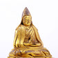 A serene gilt bronze statue of Tsongkhapa