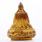 A serene gilt bronze statue of Tsongkhapa