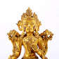 A serene gilt bronze green Tara statue