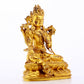 A serene gilt bronze green Tara statue