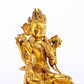 A serene gilt bronze green Tara statue