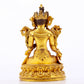 A serene gilt bronze green Tara statue