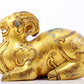 A serene gilt bronze auspicious animal ornaments