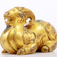 A serene gilt bronze auspicious animal ornaments