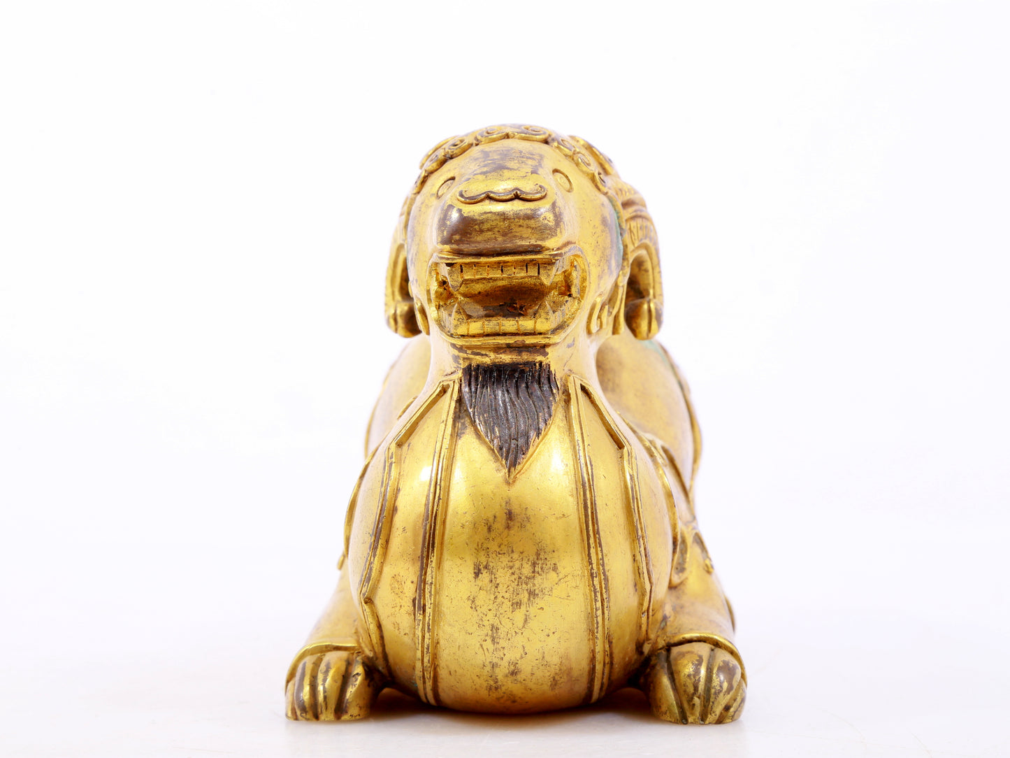 A serene gilt bronze auspicious animal ornaments