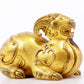 A serene gilt bronze auspicious animal ornaments