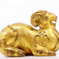 A serene gilt bronze auspicious animal ornaments