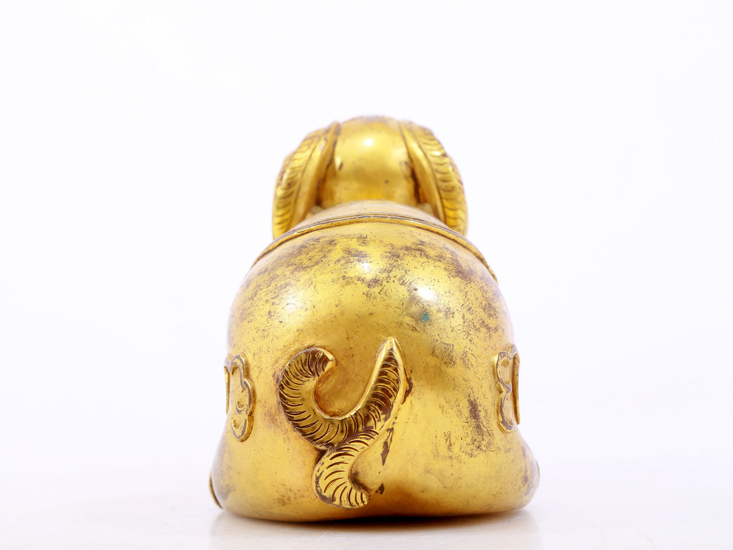 A serene gilt bronze auspicious animal ornaments