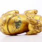 A serene gilt bronze auspicious animal ornaments