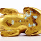 A serene gilt bronze auspicious animal ornaments