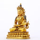 A serene gilt bronze statue of Amitayus Buddha