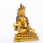 A serene gilt bronze statue of Amitayus Buddha