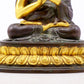 A serene gilt bronze statue of the master