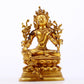 A serene gilt bronze green Tara statue