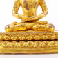 A serene gilt bronze statue of Amitayus Buddha