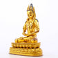 A serene gilt bronze statue of Amitayus Buddha