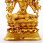 A serene gilt bronze green Tara statue