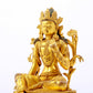 A serene gilt bronze green Tara statue