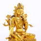 A serene gilt bronze green Tara statue