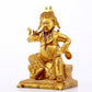 A serene gilt bronze statue of Guan Gong,