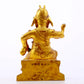 A serene gilt bronze statue of Guan Gong,