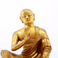 A serene gilt bronze Arhat statue,