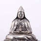 A serene gilt bronze Tsongkhapa