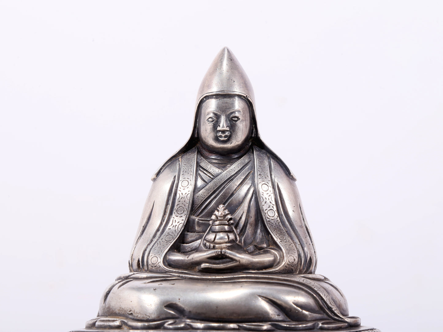 A serene gilt bronze Tsongkhapa