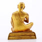 A serene gilt bronze Arhat statue,