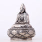 A serene gilt bronze Tsongkhapa