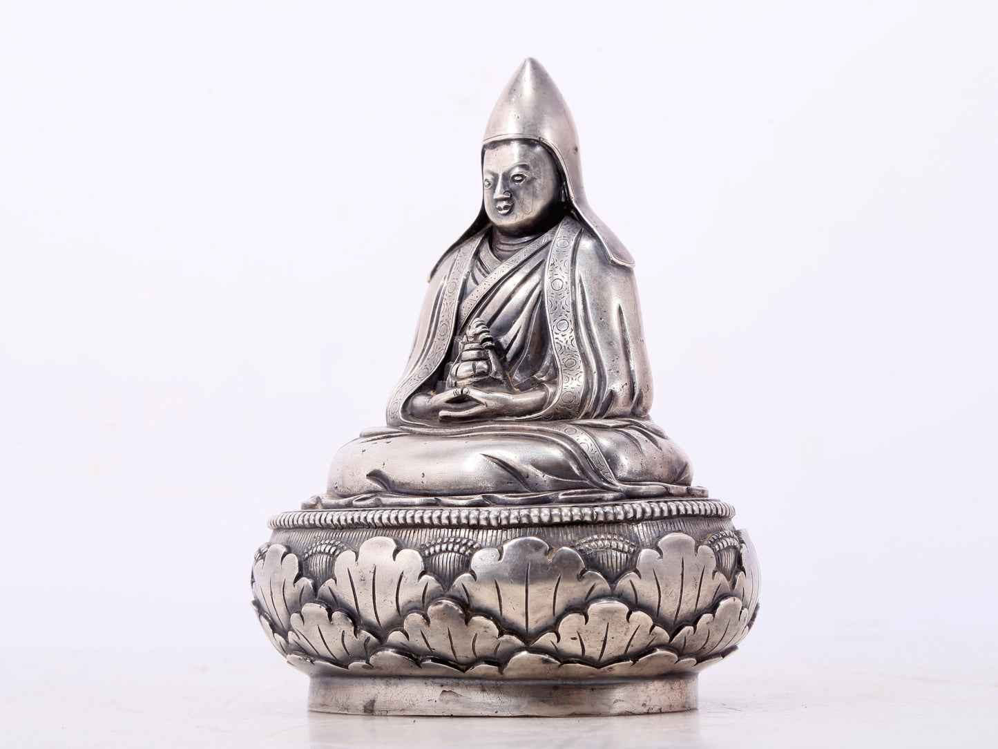 A serene gilt bronze Tsongkhapa