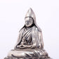 A serene gilt bronze Tsongkhapa