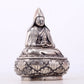 A serene gilt bronze Tsongkhapa