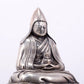 A serene gilt bronze Tsongkhapa