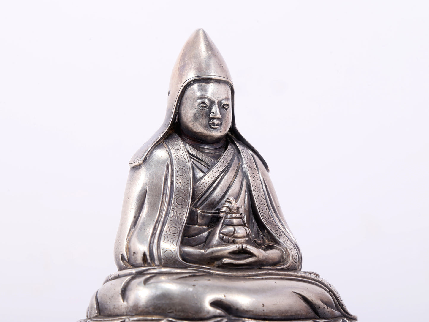 A serene gilt bronze Tsongkhapa