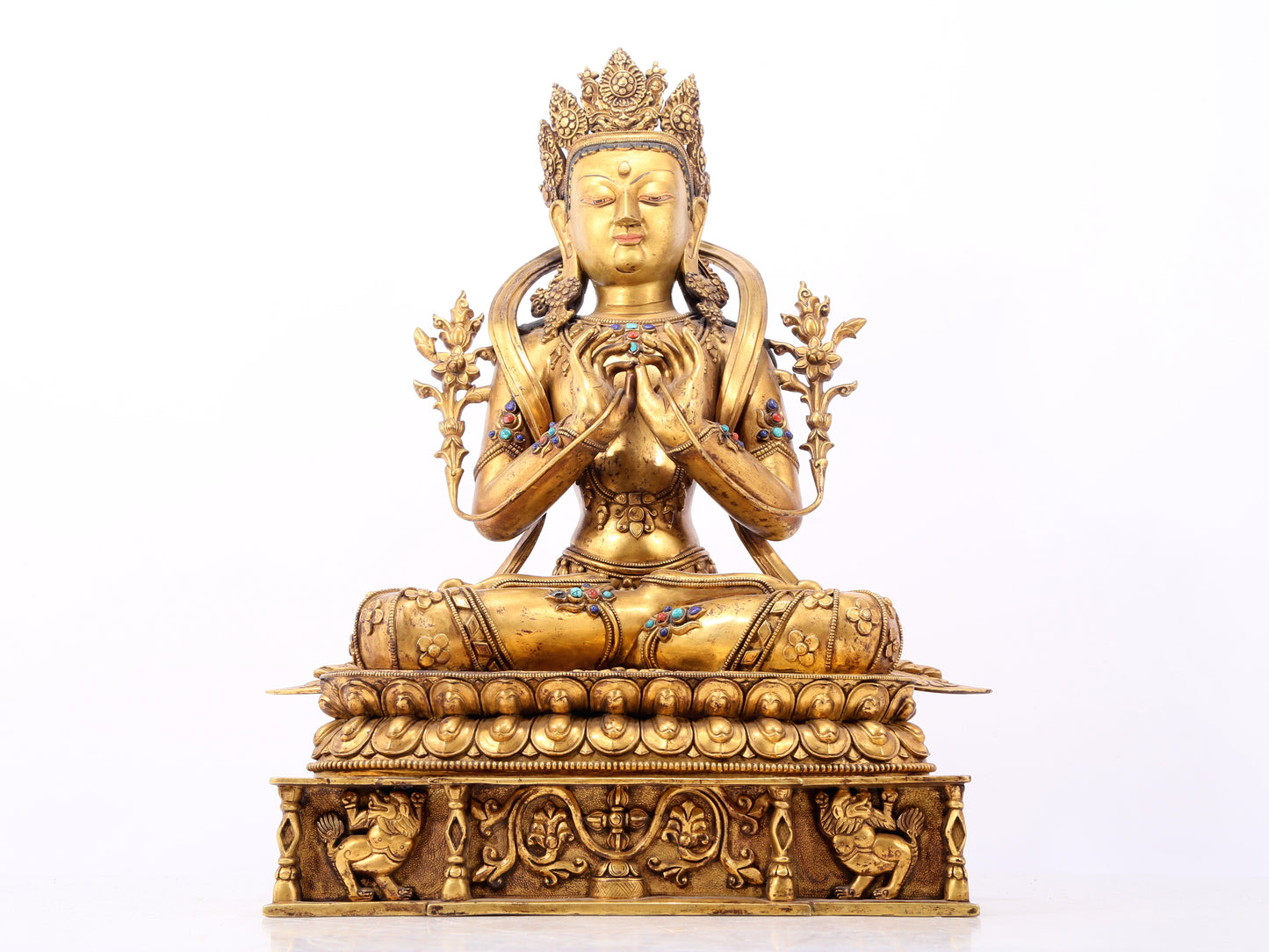 A serene gilt bronze statue of Bodhisattva inlaid with hundreds of treasures