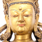 A serene gilt bronze statue of Bodhisattva inlaid with hundreds of treasures