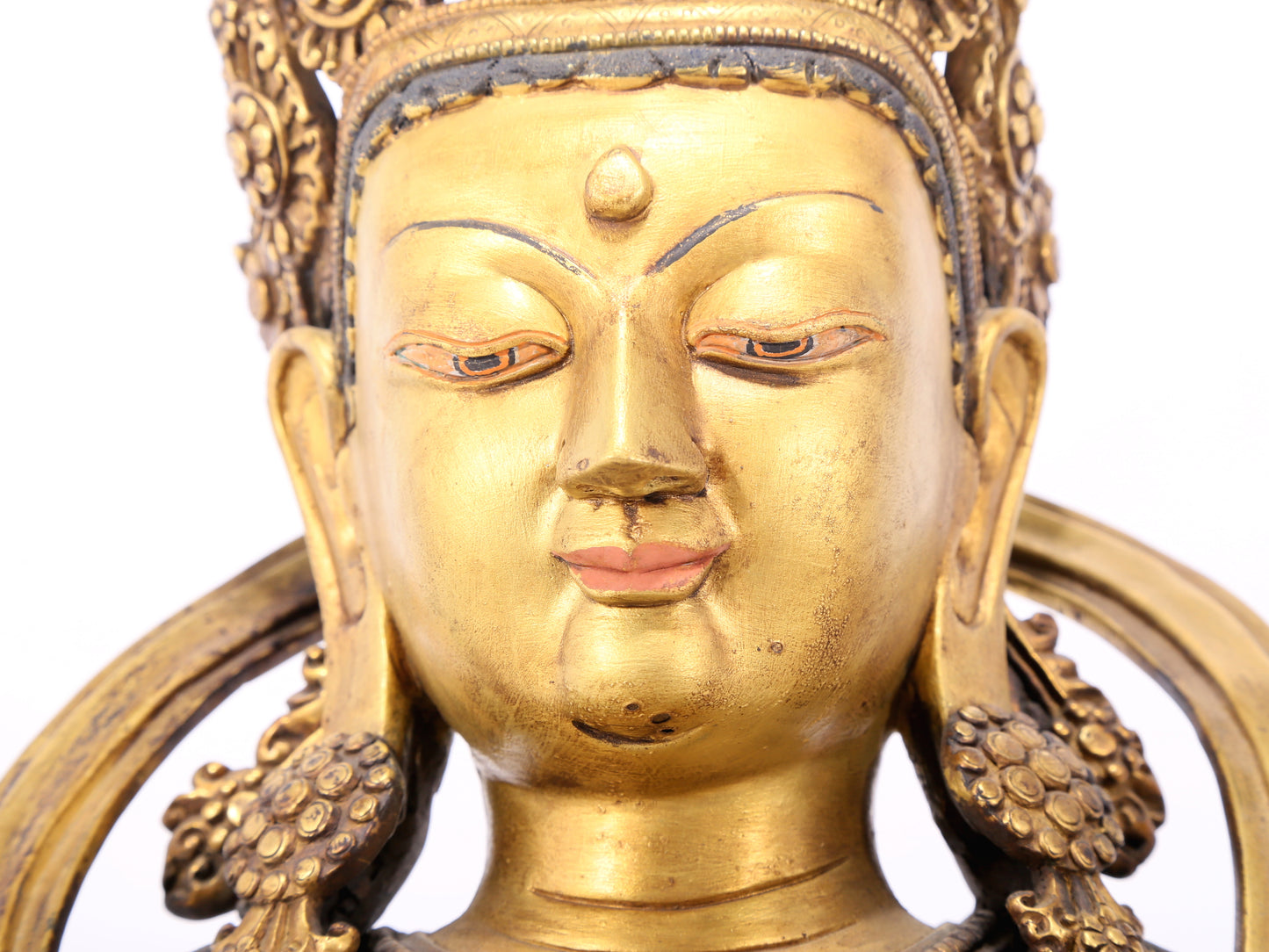 A serene gilt bronze statue of Bodhisattva inlaid with hundreds of treasures