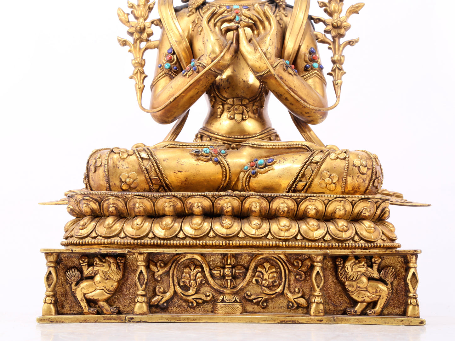 A serene gilt bronze statue of Bodhisattva inlaid with hundreds of treasures