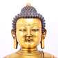 A serene gilt bronze statue of Gautama Buddha