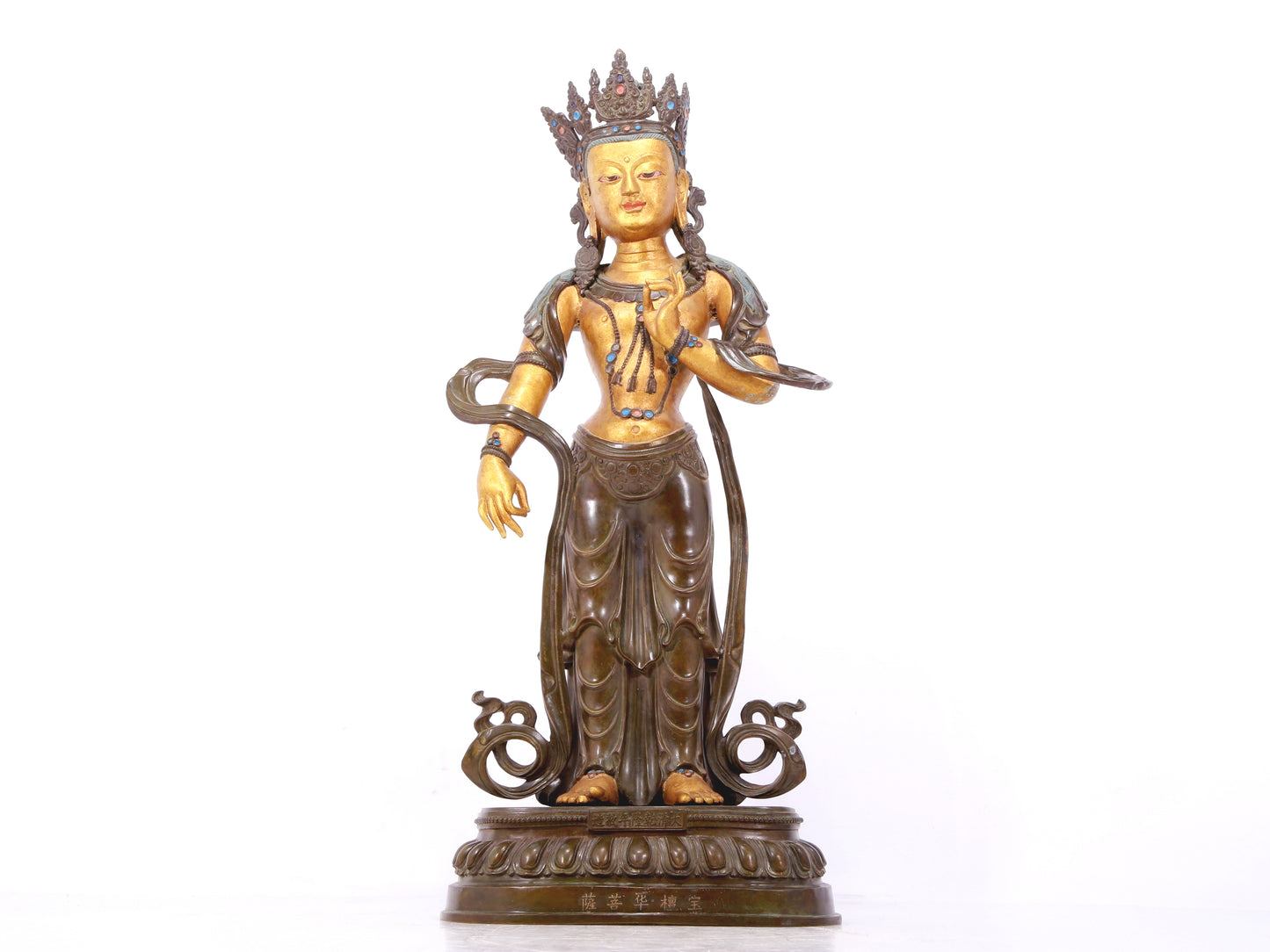 A serene gilt bronze Bodhisattva statue