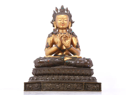 A serene gilt bronze statue of Bodhisattva inlaid with hundreds of treasures